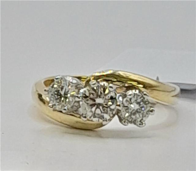 18ct gold diamond ring with 0.75 carats of diamonds in size L, featuring a sleek, elegant design.