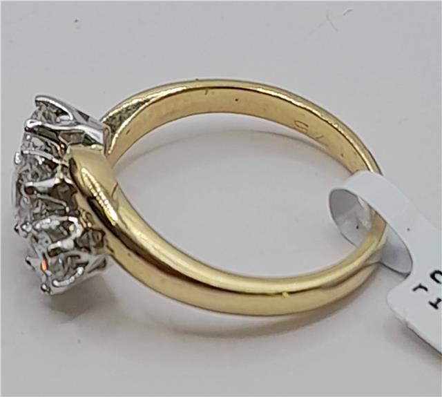 18ct gold diamond ring with 0.75 carats, size L, featuring a sleek band and sparkling diamond setting.