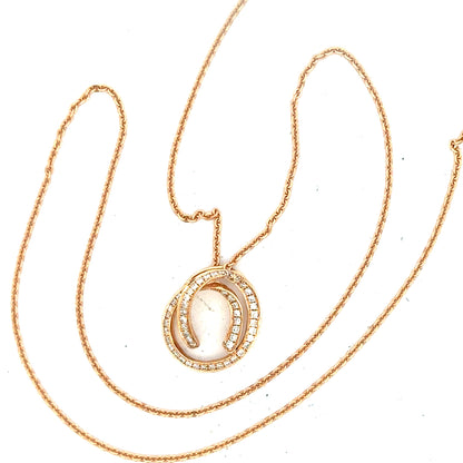 18ct gold chain with diamond pendant, showcasing a delicate necklace with sparkling diamonds on a fine gold link.