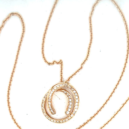 18ct gold chain with diamond pendant, unbranded, showcasing a delicate gold chain and sparkling diamond pendant on a white background.