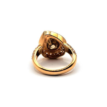 18ct rose gold ring featuring a 2.65 carat pear-cut brown diamond, elegant jewelry piece with a sleek design