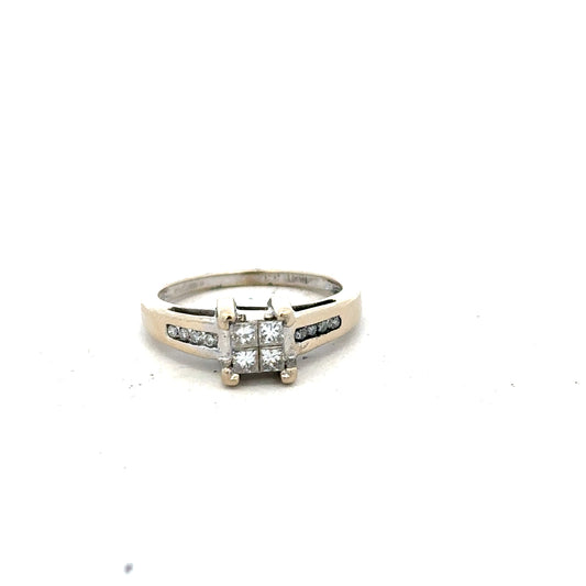 18ct white gold diamond ring with 0.33 carats, size L, featuring a delicate band and sparkling diamonds.