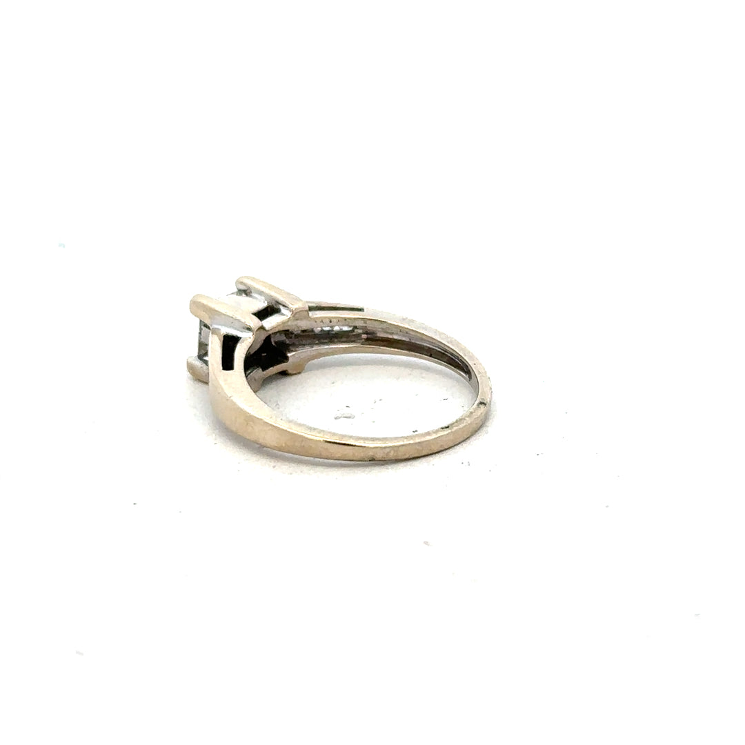 18ct white gold diamond ring with 0.33 carats of diamonds in size L, featuring a sleek and elegant design.