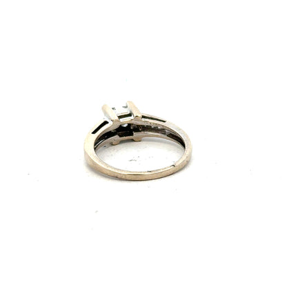 18ct white gold diamond ring with 0.33 carats, size L, featuring a sleek design and sparkling diamonds.