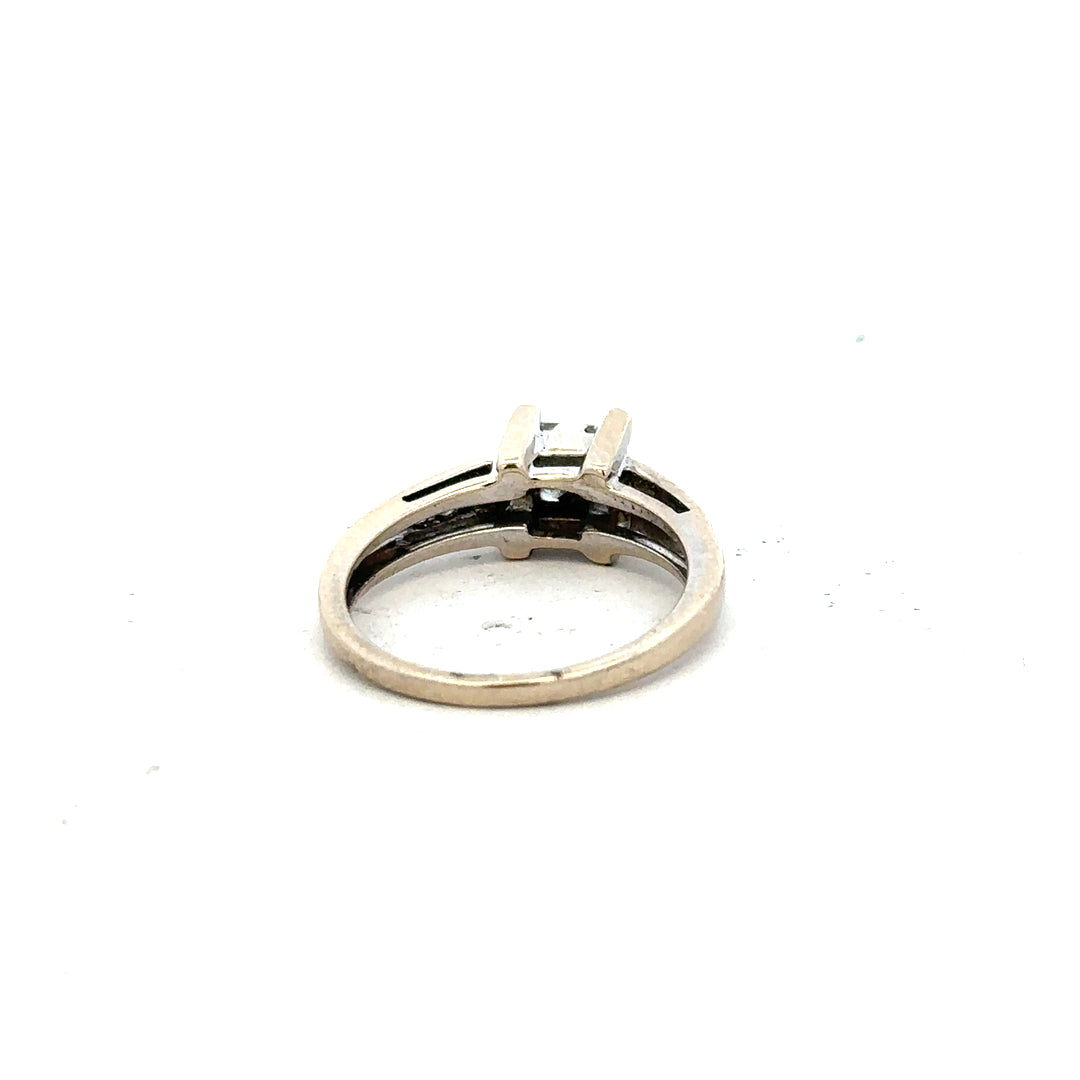 18ct white gold diamond ring with 0.33 carats of diamonds, size L, featuring a sleek, elegant design.
