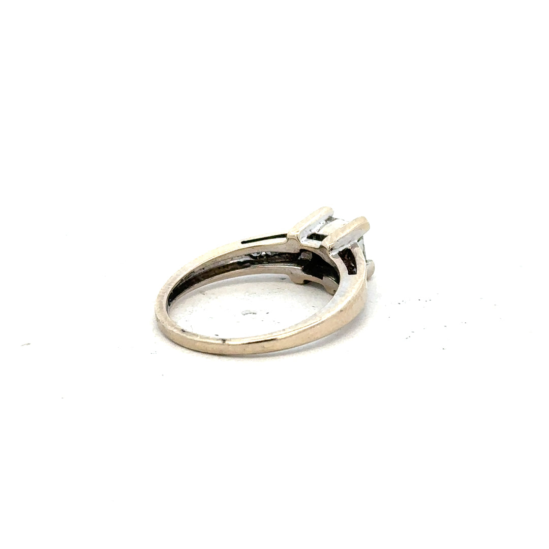 18ct white gold diamond ring with 0.33 carats of diamonds in size L, featuring a sleek and elegant design.