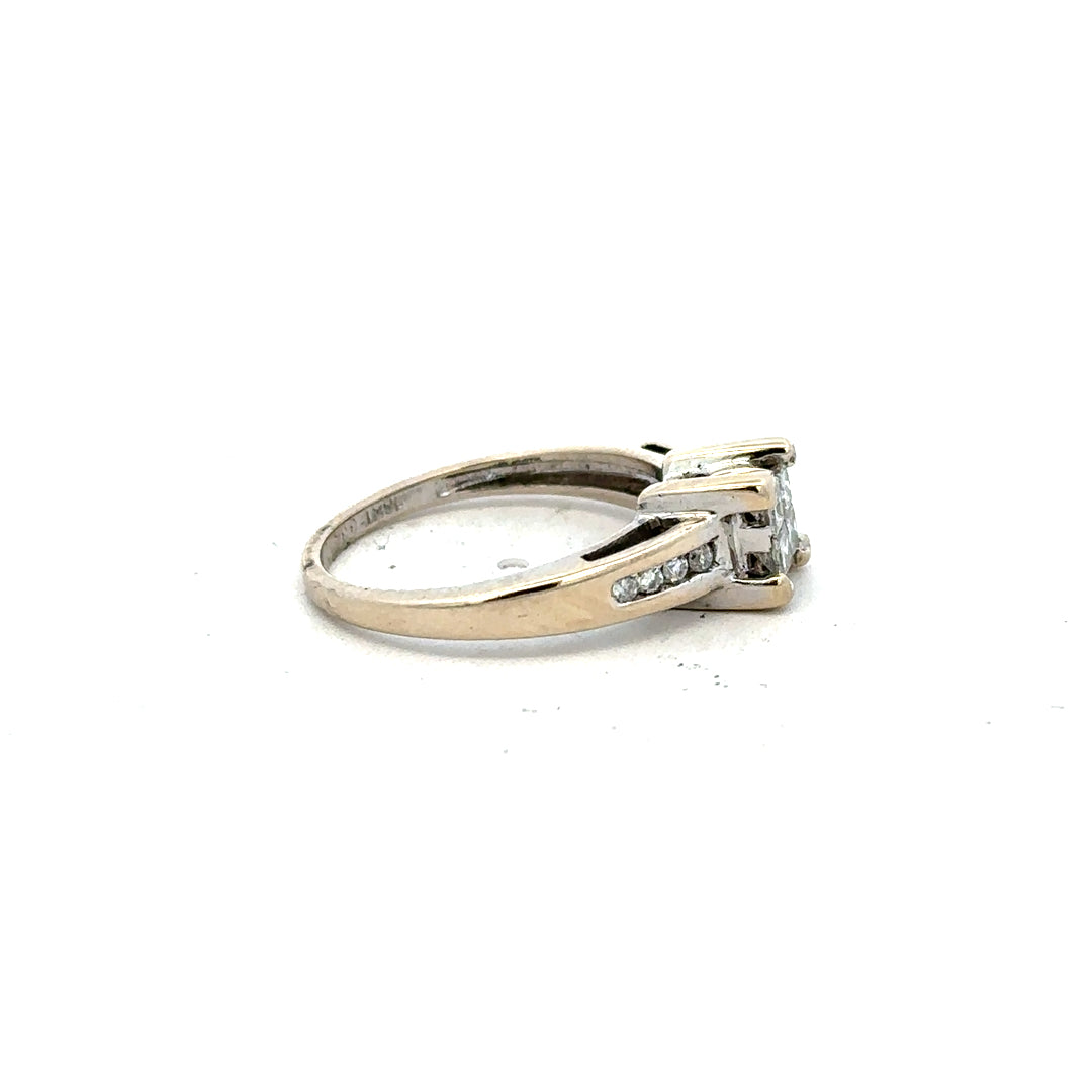18ct white gold diamond ring with 0.33 carats of diamonds in size L, featuring a classic elegant design.