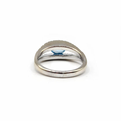18ct white gold ring featuring a 0.40 carat topaz and 0.45 carat diamond accents, elegant jewelry accessory.