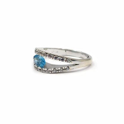 18ct white gold ring featuring a 0.40 carat topaz and 0.45 carat diamond accent, elegant jewelry with sparkling gemstones.