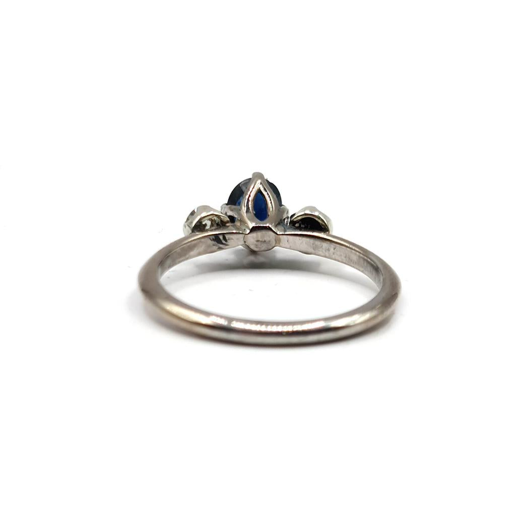 18ct white gold sapphire ring with 0.70 and 0.30 carat sapphires, showcasing a sparkling gemstone design.