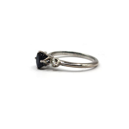 18ct white gold sapphire ring with 0.70 and 0.30 carat sapphires, featuring a sleek design and sparkling gemstones.
