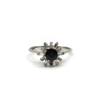 18ct white gold diamond cluster ring with 0.81 carats of sparkling diamonds, showcasing a luxurious and elegant jewelry design.