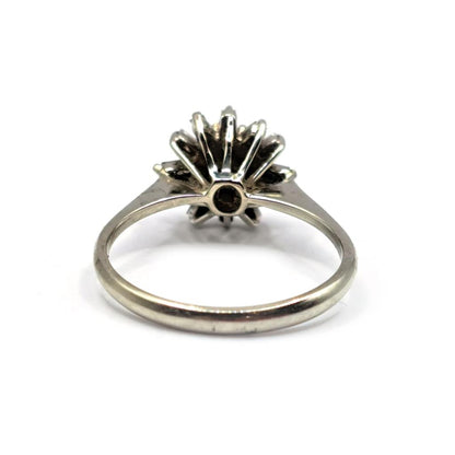 18ct white gold diamond cluster ring featuring a 0.81 carat total diamond weight, elegant and sparkling jewelry piece.
