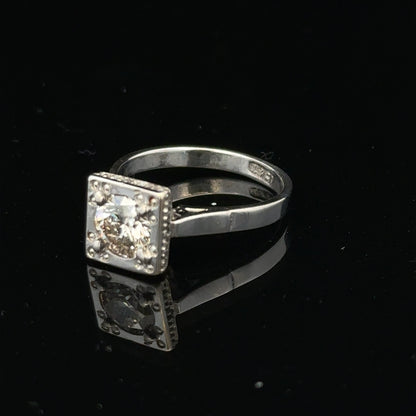 18ct white gold diamond ring with 0.89ct round diamonds, size L, showcasing a sleek, elegant design with a polished finish.