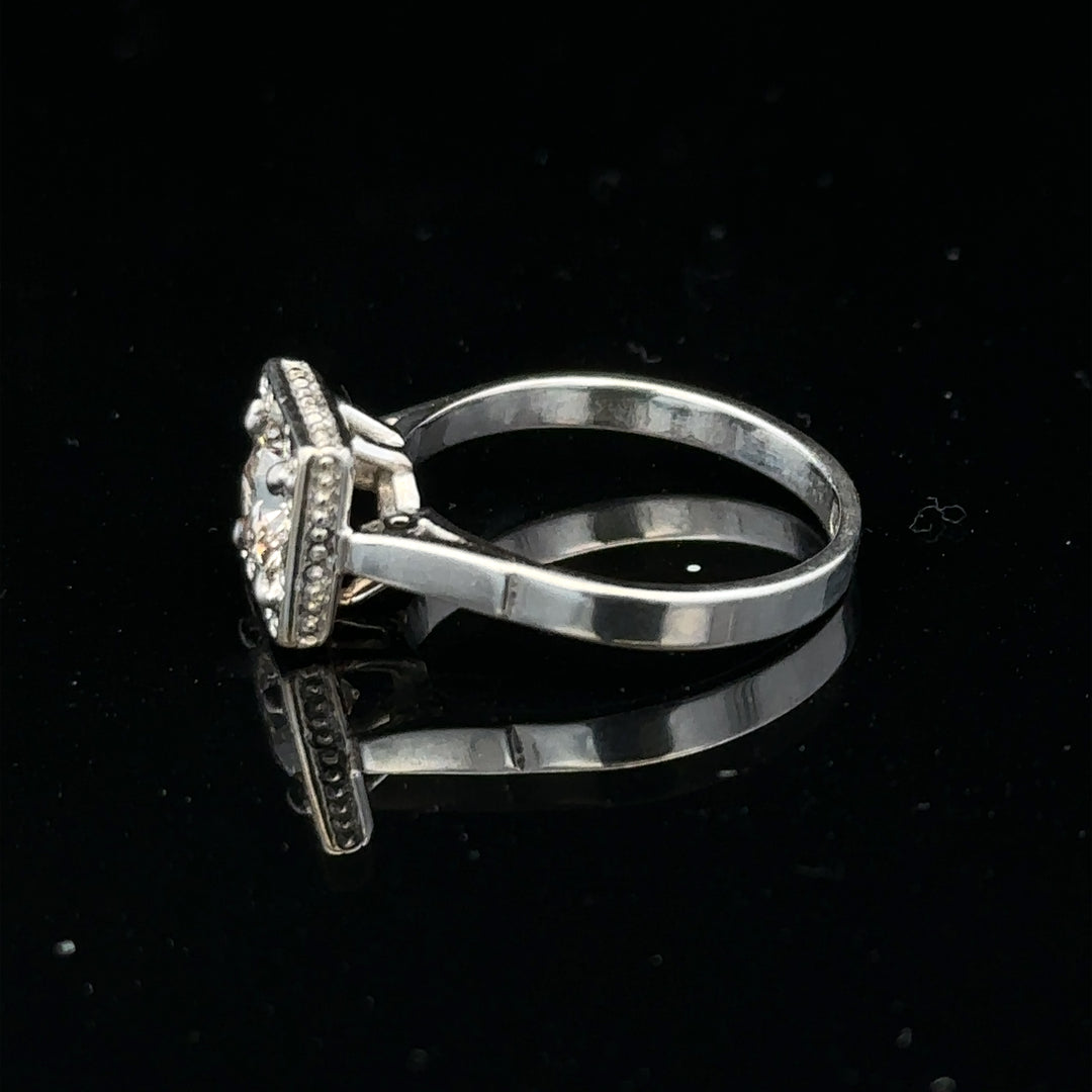 Elegant 18ct white gold diamond ring with 0.89ct diamonds in size L, showcasing a polished band and sparkling gemstones.