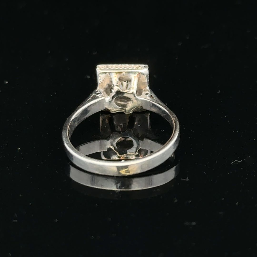 18ct white gold diamond ring with 0.89ct diamonds, size L, showcasing a elegant design and polished finish.