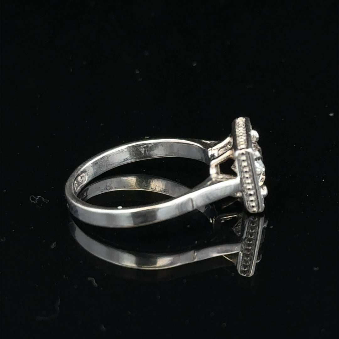 18ct white gold diamond ring with 0.89ct diamonds, size L, unbranded, featuring a sleek design and 3.9g weight.