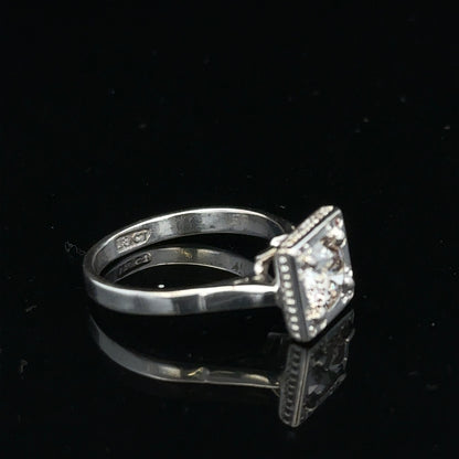 18ct white gold diamond ring with 0.89ct diamonds, size L, featuring a sleek band and elegant design.