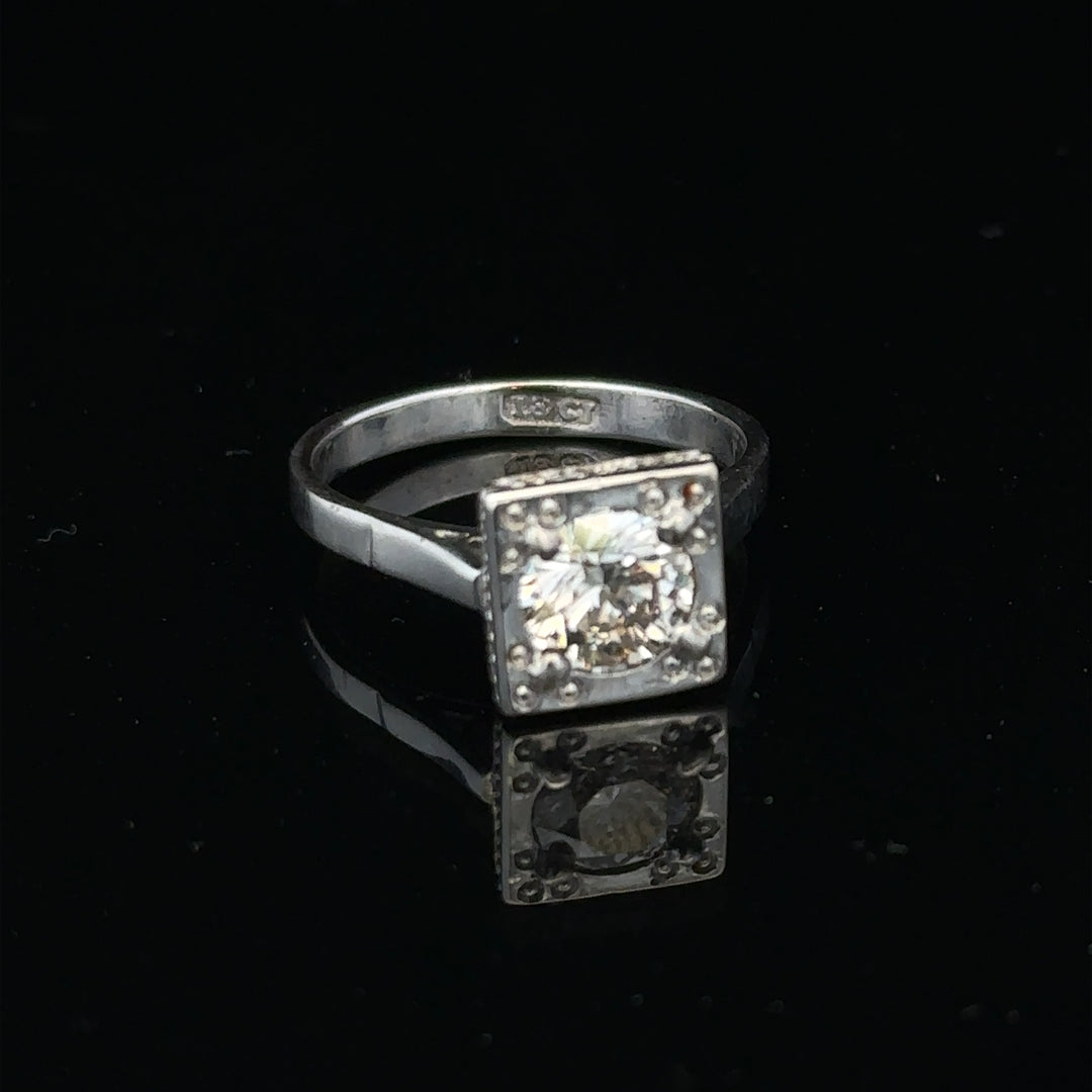 18ct white gold diamond ring with 0.89ct diamonds, size L, showcasing elegant design and sparkling gemstones.