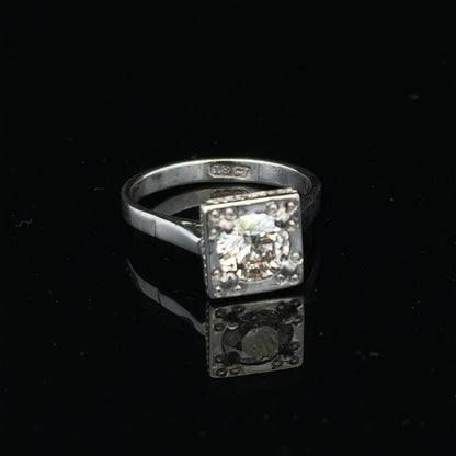 18ct white gold diamond ring with 0.89ct diamonds, size L, showcasing elegant design and sparkling gemstones.