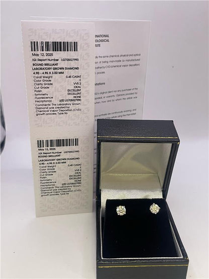 18ct white gold lab diamond earring with 0.9 carats, featuring a sparkling solitaire design.