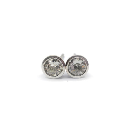 18ct white gold diamond stud earrings featuring 0.90 carats of sparkling diamonds, classic and elegant jewelry accessory.