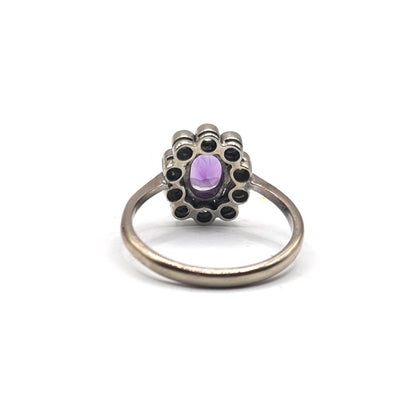 18ct white gold ring with 1.00 carat amethyst and 0.30 carat diamond, size P1/2, featuring a elegant gemstone design.
