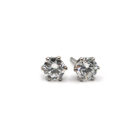 18ct white gold diamond stud earrings with a 1.09 carat single stone diamond, showcasing elegant, classic jewelry design.