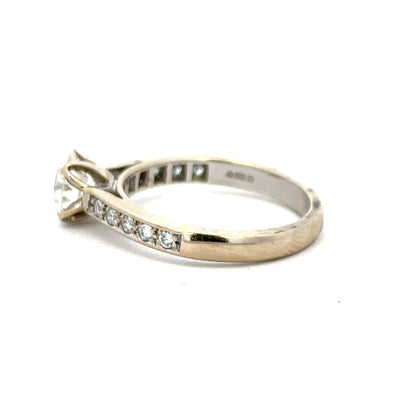18ct white gold diamond ring with 1.135 carats, color I, clarity SI1, featuring a sparkling central diamond.