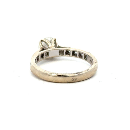18ct white gold diamond ring with 1.135 carats, Color I, Clarity SI1, showcasing a sparkling central diamond.