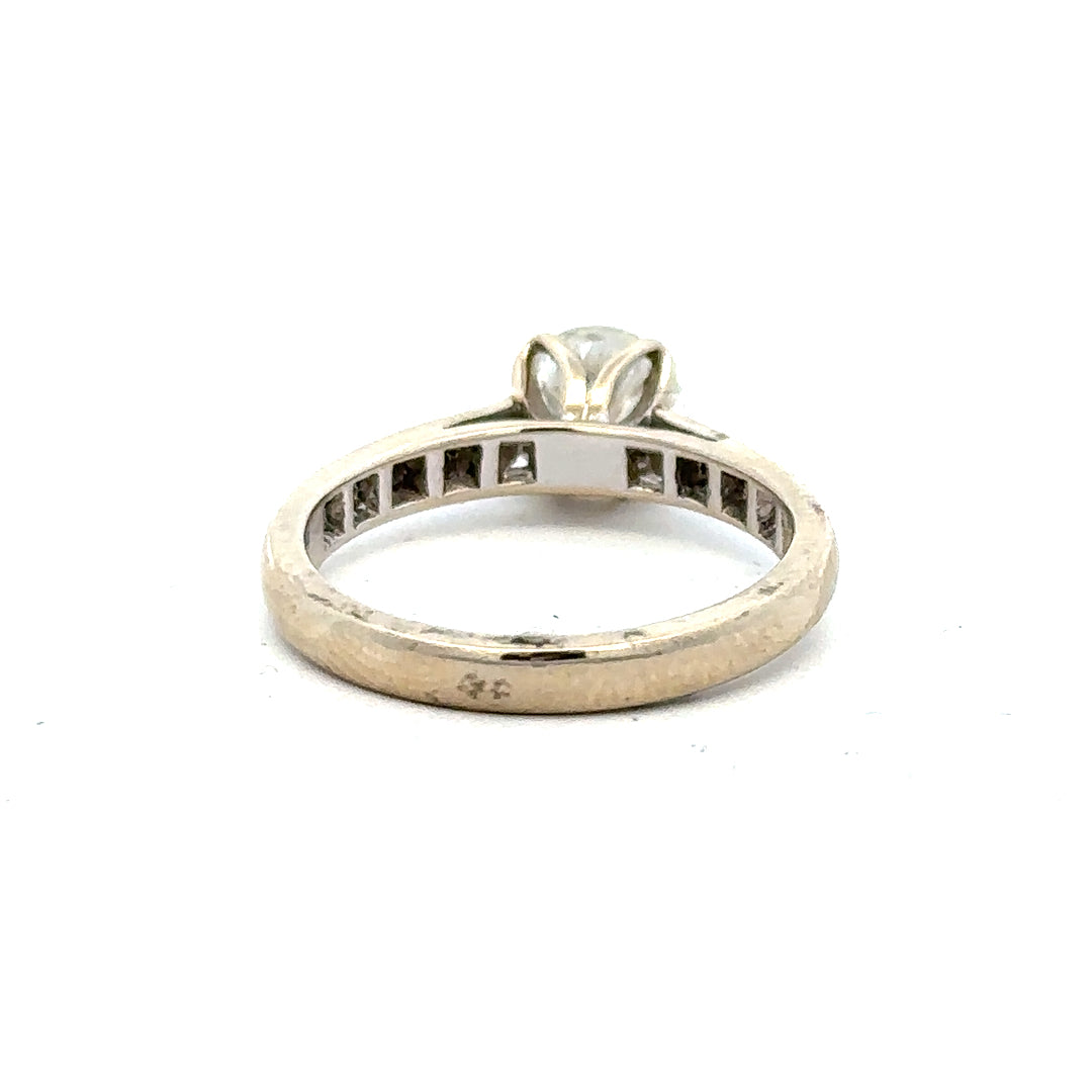 18ct white gold diamond ring with 1.135 carats, color I, clarity SI1, showcasing a sparkling central diamond.