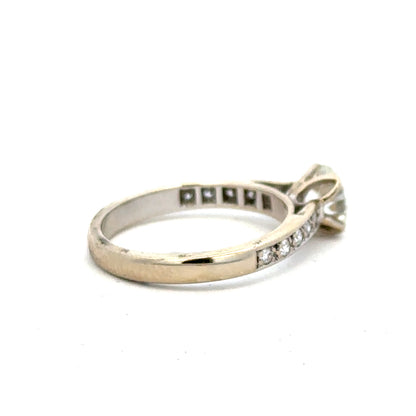 18ct white gold diamond ring with 1.135 carats, color I, clarity SI1, featuring a sparkling central diamond.