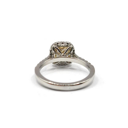 18ct white gold ring with a 1.15 carat fancy yellow diamond and VS1 clarity, accented by 0.60 carat diamonds.