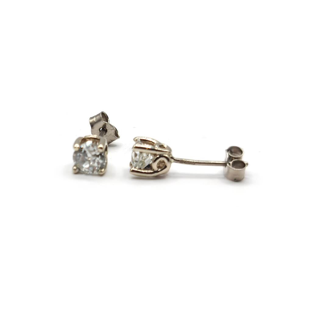 18ct white gold diamond earrings featuring 1.17 carats of sparkling diamonds, elegant and luxurious jewelry accessory.