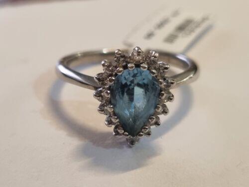 Unbranded 18ct white gold ring featuring a 1.90 carat pear-shaped topaz and 0.40 carat diamonds. Elegant jewelry design.