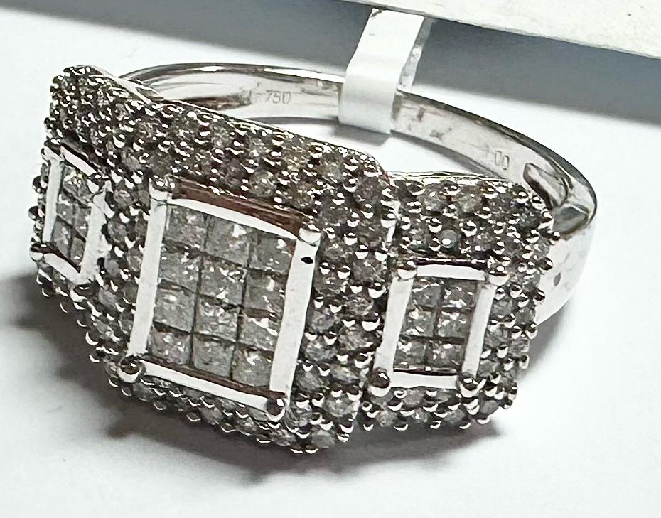 18ct white gold diamond ring with 1 carat center stone, size Q1/2, featuring a sleek band and sparkling diamonds.