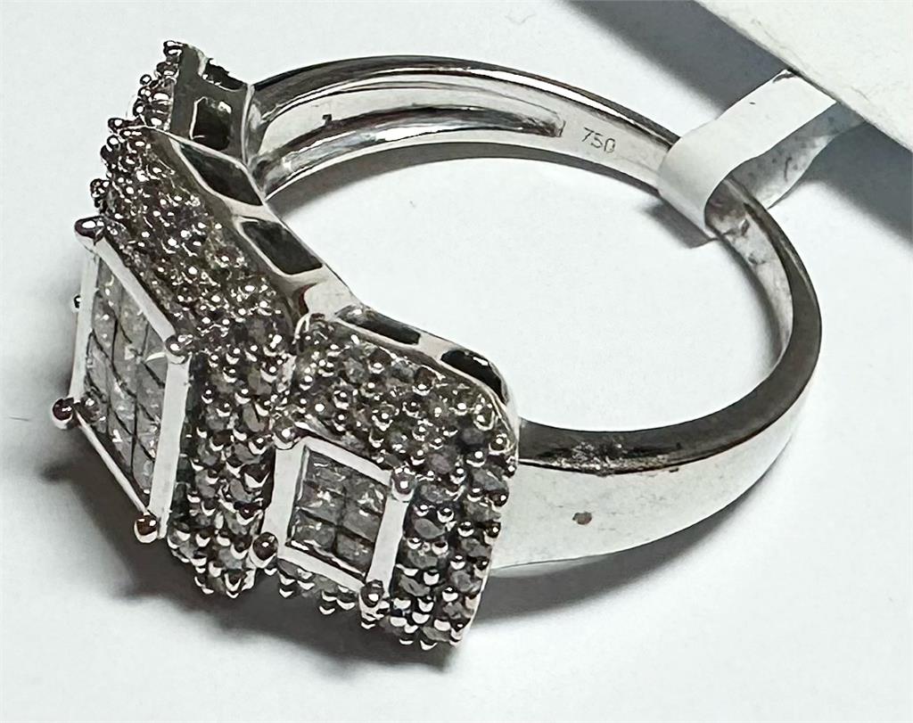 18ct white gold diamond ring with 1 carat center stone, size Q1/2, featuring a sleek, elegant design.