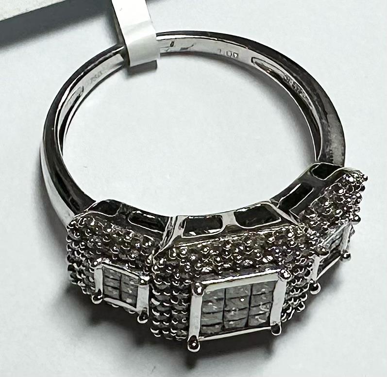 18ct white gold diamond ring with 1 carat center stone in size Q1/2, showcasing a sparkling, elegant jewelry piece.
