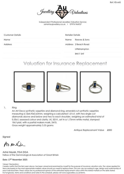 18ct white gold and platinum diamond and sapphire ring with intricate design and gemstone accents.