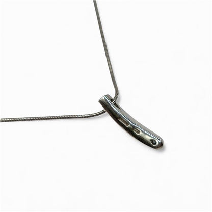18ct white gold chain with diamond pendant, featuring a delicate design and sparkling diamonds, unbranded jewelry accessory.