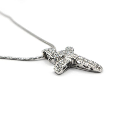 18ct white gold chain with 0.65 carat diamond twist cross pendant, elegant jewelry piece featuring a sparkling diamond design.