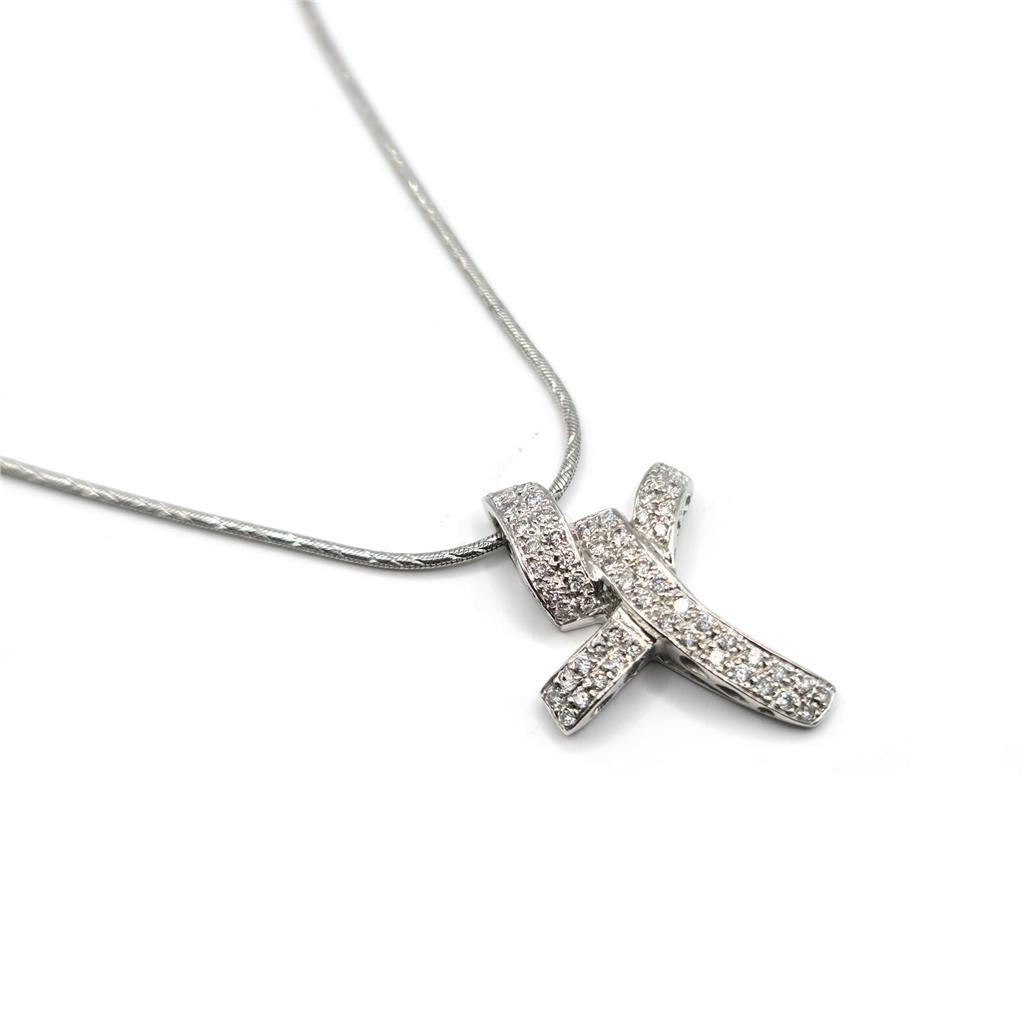 18ct white gold chain with 0.65 carat diamond twist design cross, featuring elegant craftsmanship and sparkling diamonds.