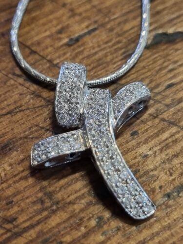 18ct white gold chain with 0.65 carat diamond twist design cross ring, featuring elegant craftsmanship and sparkling diamonds.