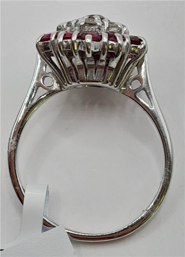18ct white gold diamond and ruby ring featuring sparkling diamonds and vibrant rubies, elegant jewelry piece.