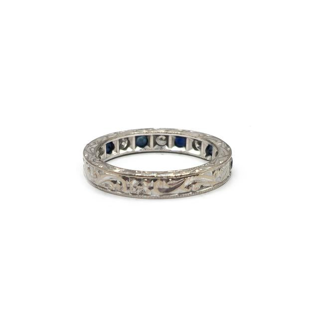 18ct white gold diamond and sapphire half eternity ring with alternating gemstones, elegant unbranded jewelry design.