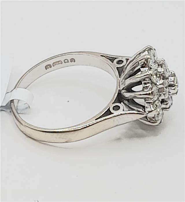 18ct white gold diamond cluster ring in size L featuring a sparkling diamond design and elegant craftsmanship.