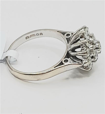 18ct white gold diamond cluster ring in size L featuring a sparkling diamond design and elegant craftsmanship.