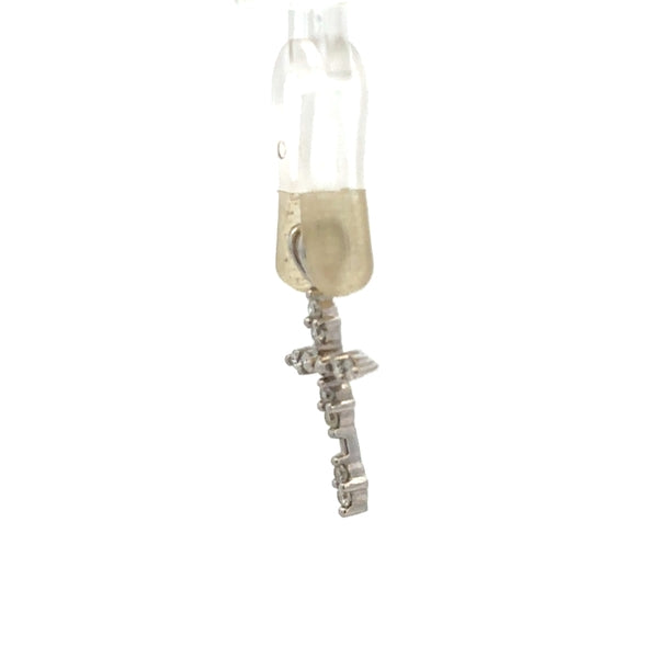 18ct white gold diamond cross pendant, delicate jewelry piece with sparkling diamonds, weighs 0.8 grams, unbranded.