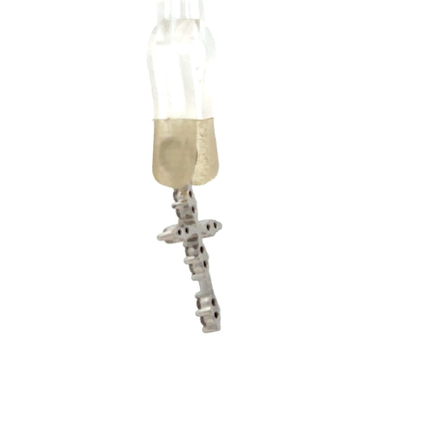 18ct white gold diamond cross pendant, delicate jewelry piece with sparkling diamonds, weighs 0.8g, unbranded, elegant accessory.
