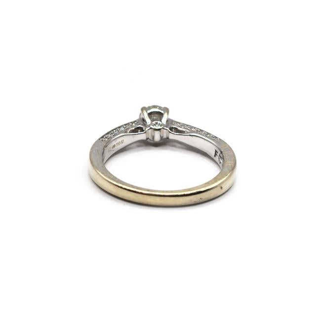 18ct white gold diamond ring with sparkling diamonds, elegant design, unbranded jewelry piece.